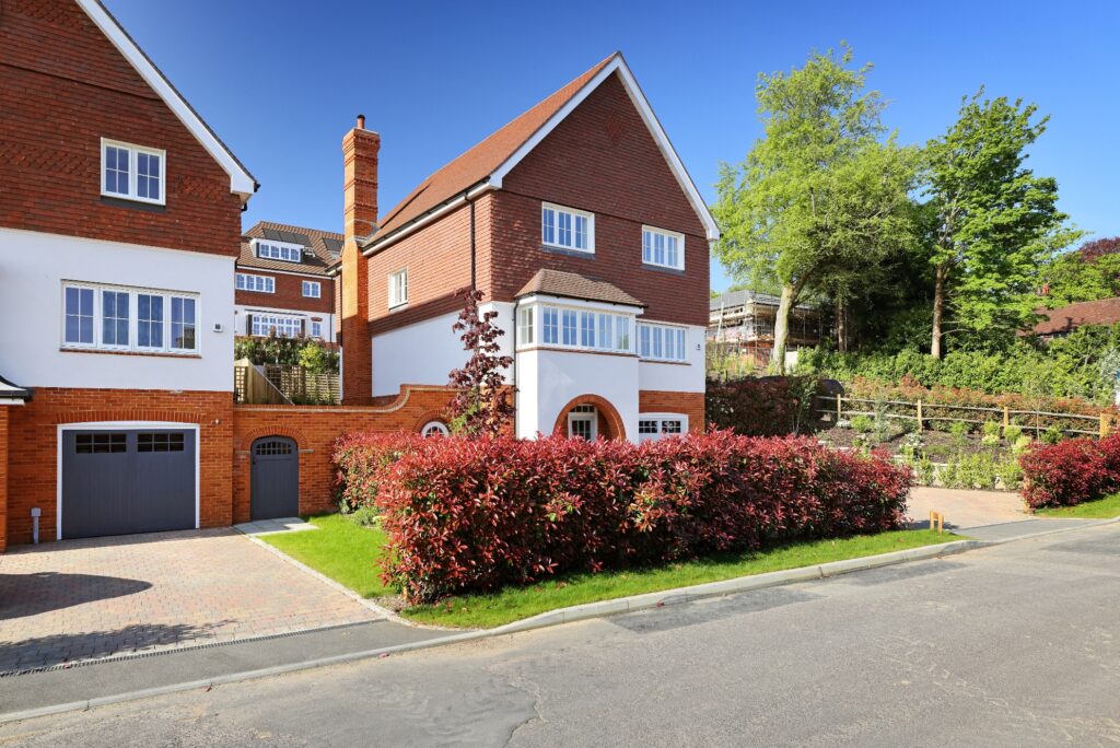 THE HOUSES AT HASLEMERE HEIGHTS